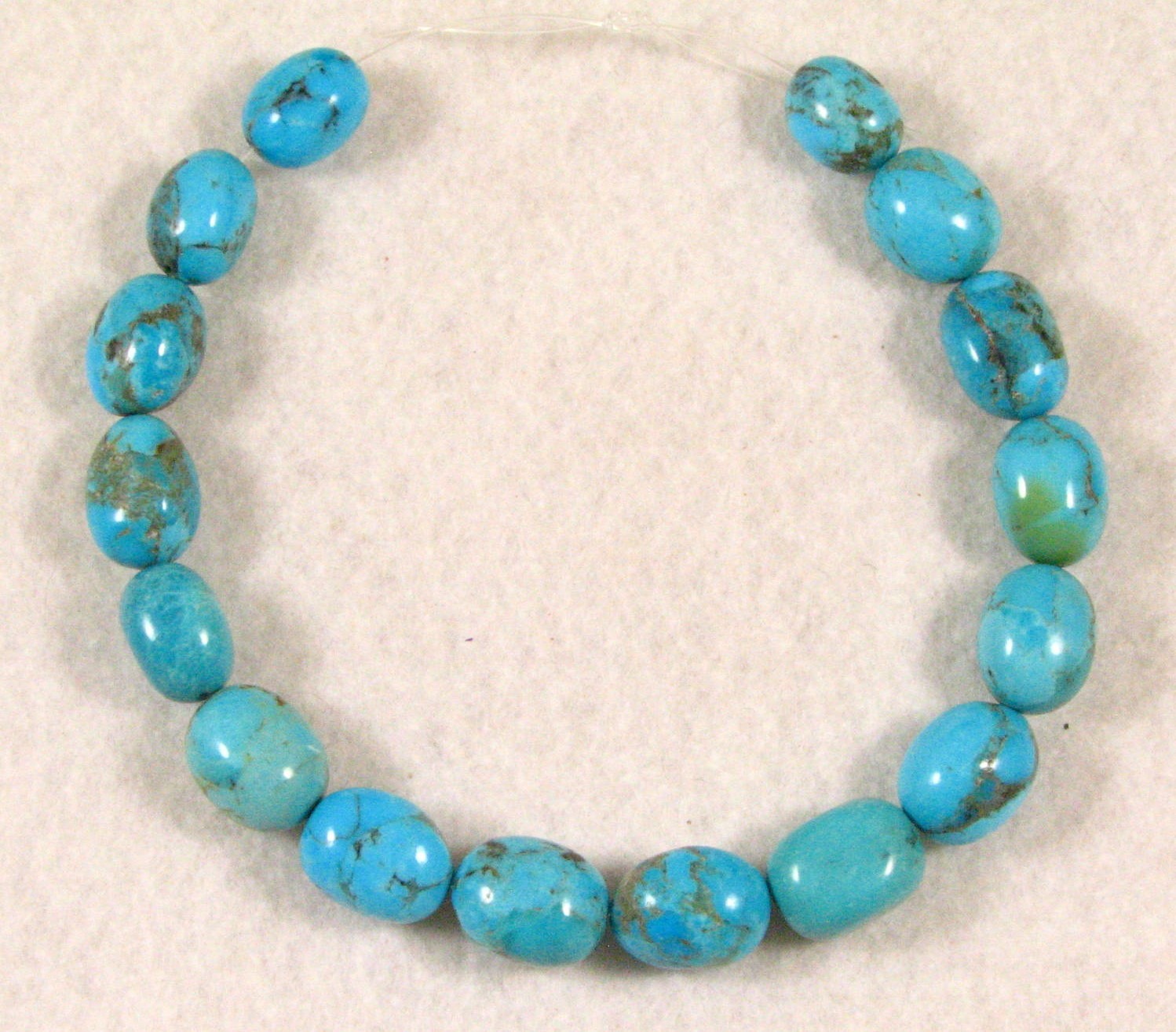 16 KINGMAN Turquoise Oval Beads 9 to 11 mm diameter by 12 to 15 mm long C