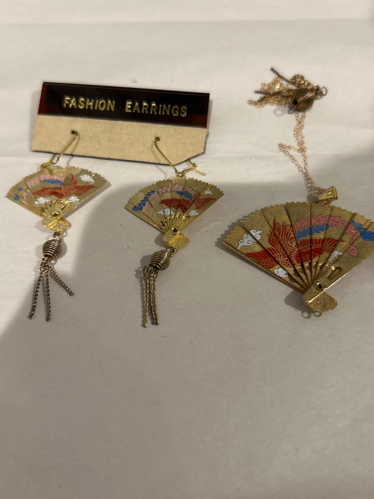 Asian Styled Adjustable Fan Earrings and Necklace. The chain is 10k