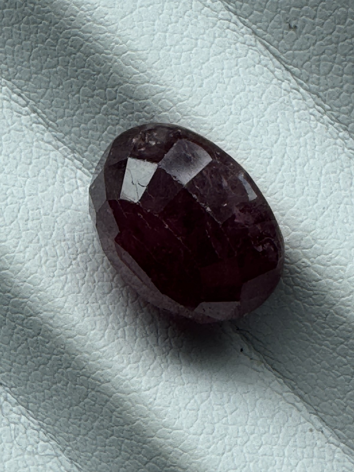 Dark Purple Red RUBY. 12 x 10 mm Oval, Slight Inclusion. 8.1 Carats.