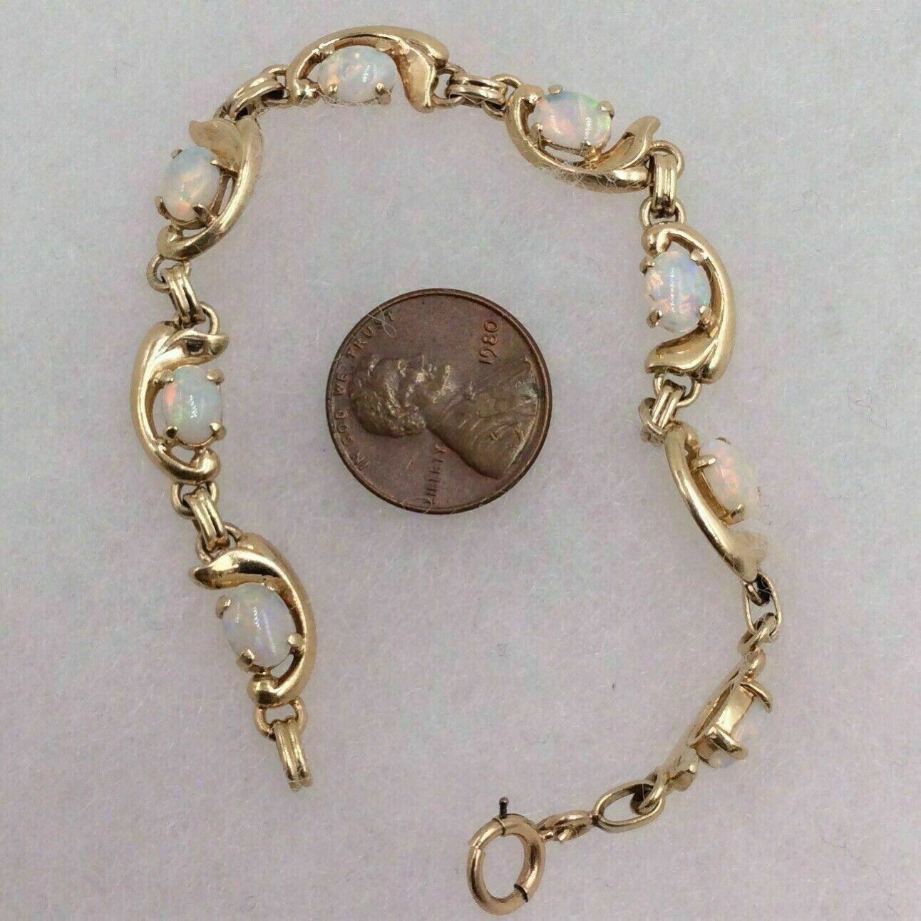 3Ct Oval Cut Lab-Created Opal Ladies Tennis Bracelet 14K Yellow Gold Finish