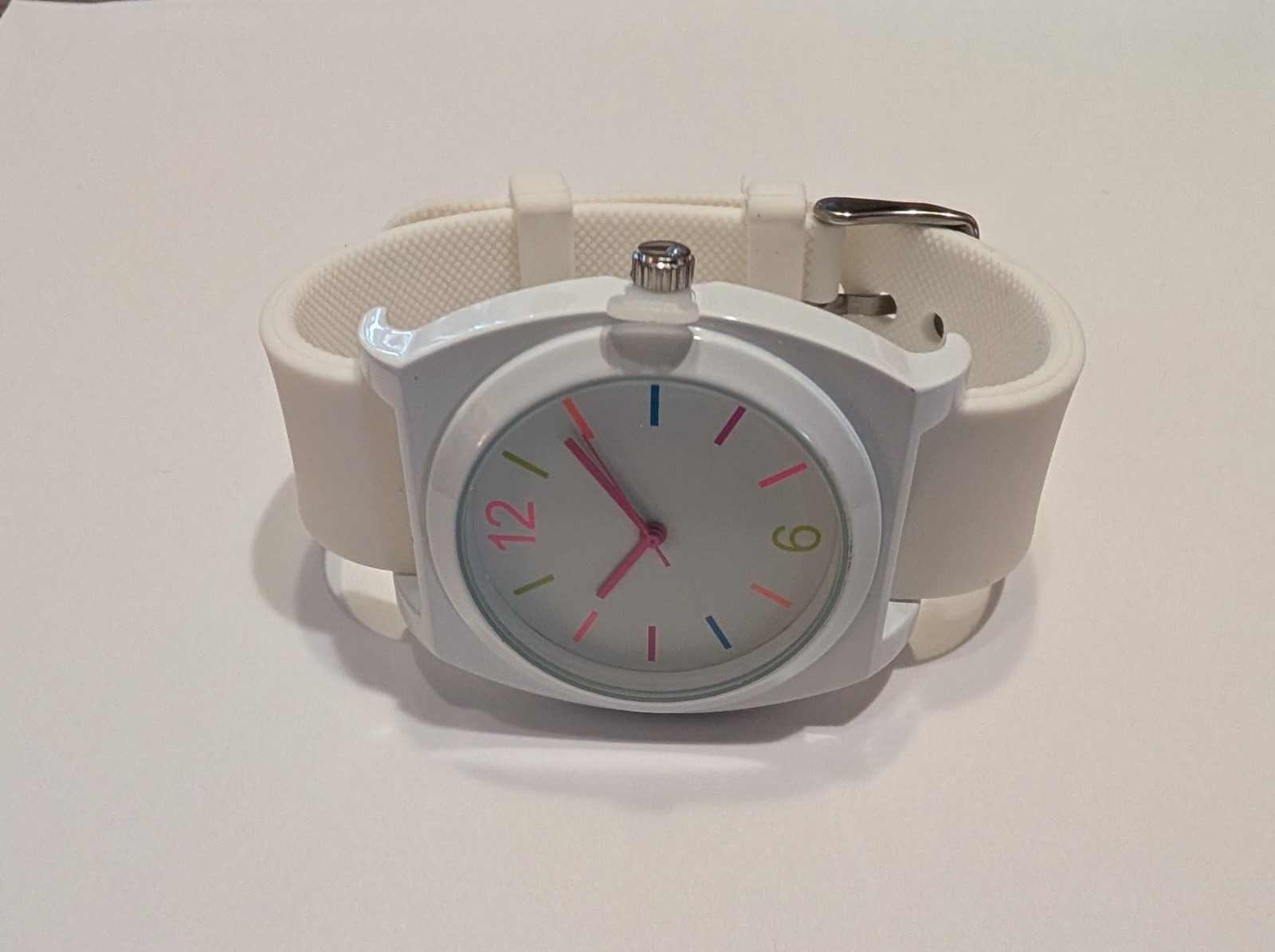 Xhilaration watch with 3 interchangeable straps: white, pink, green. MSRP $19.99