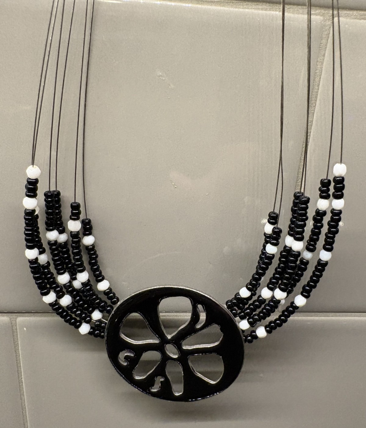 Chicos Necklace Black Pendant with Flower Cut out and Black & White Beads