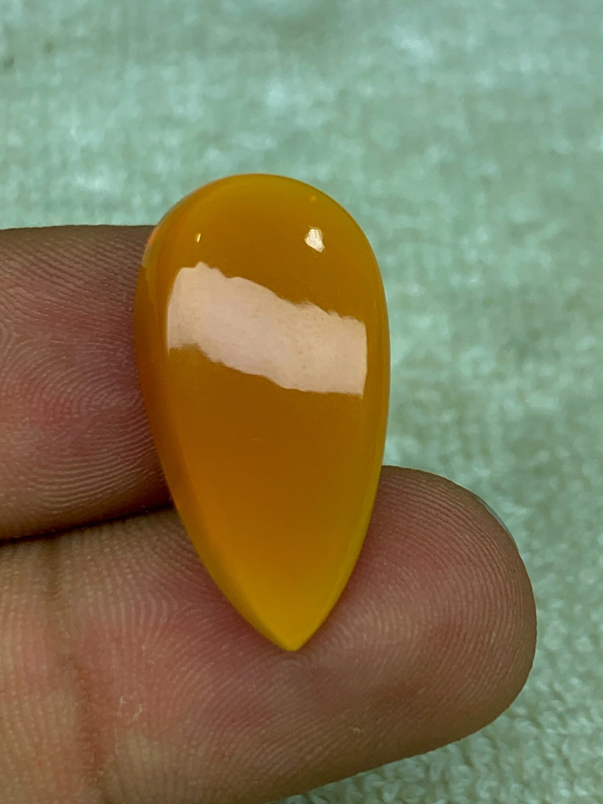 Natural Ethiopian Opal Honeycomb Pattern 14.90 Carat Multi-Fire Pear Cabochon