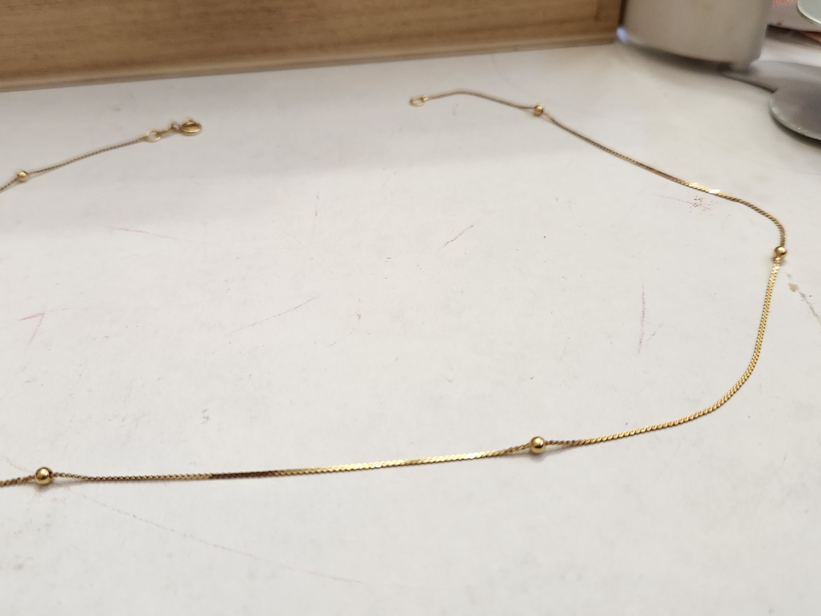 14k Gold Serpentine 17.5″ Thin Chain with 6 Tiny Beads 2 Grams Spring Ring
