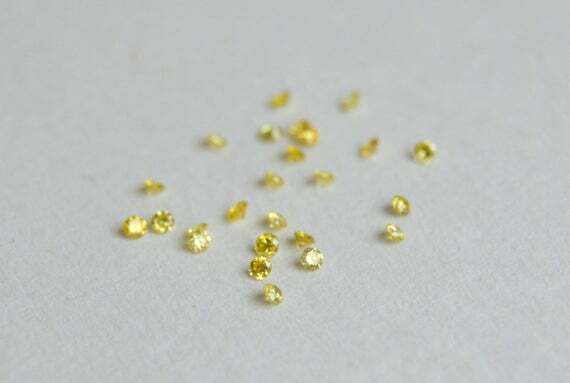 round canary yellow colored diamond .015ct Loose 1.3mm 1.4mm treated individual