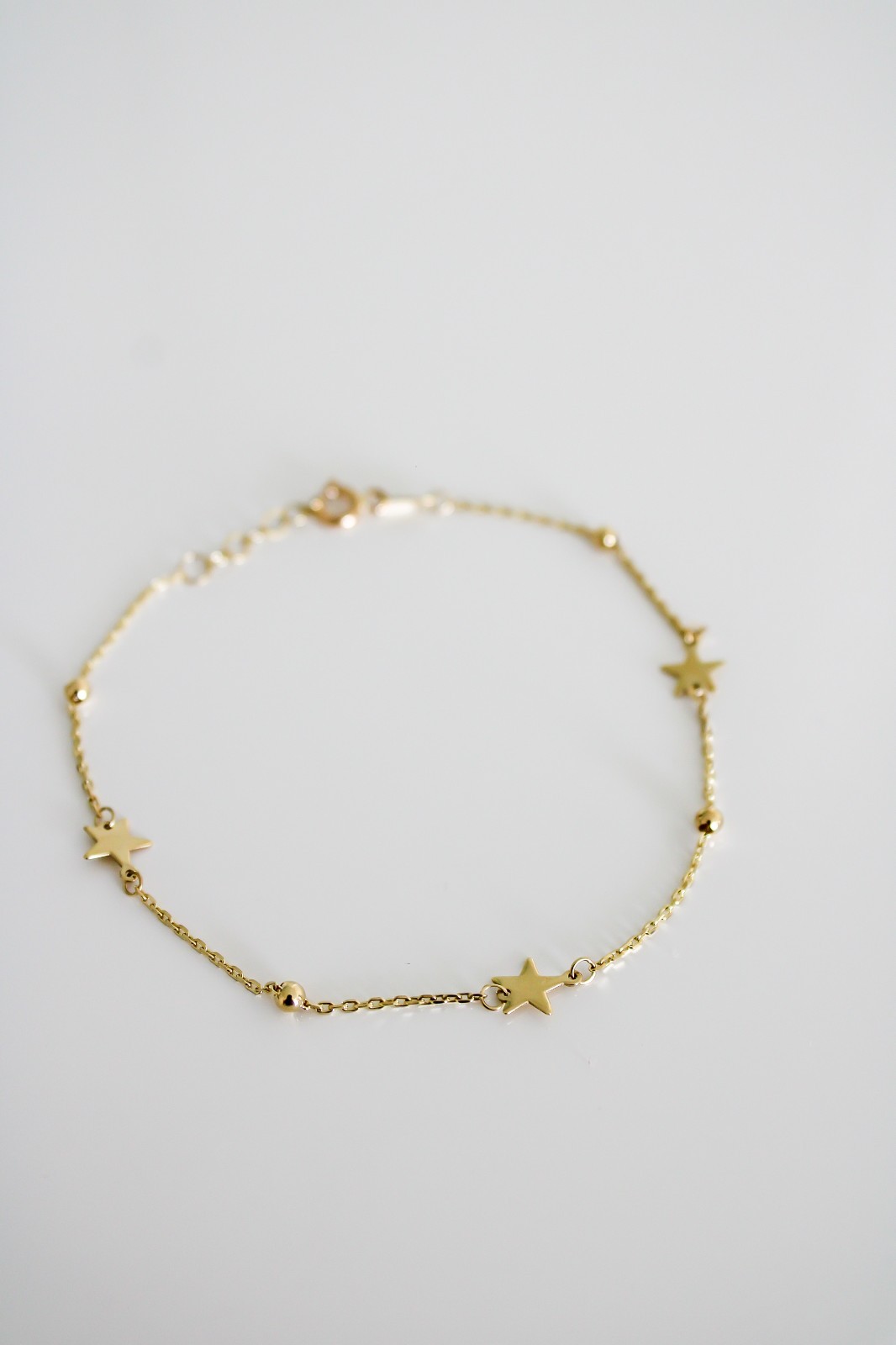 14k Solid Gold Dainty Star Bracelet Adjustable from 7″ to 7.5″ 1mm Cable Chain