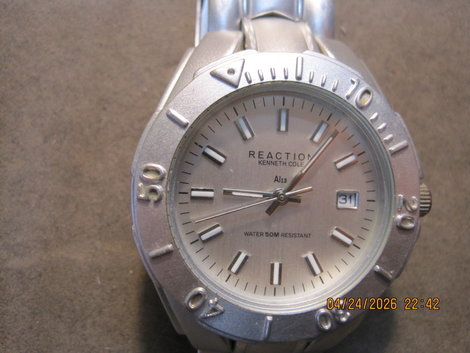 Kenneth Cole Reaction Men’s Silver Metal Wristwatch Analog Dress Stick Indexes