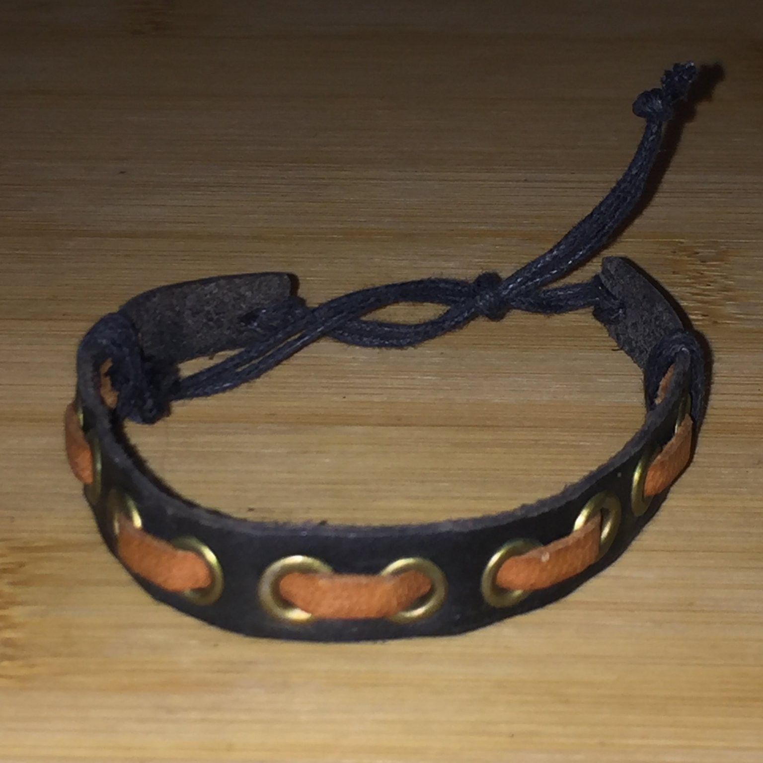 Faux Leather Woven Grommet Bracelet Adjustable Cord Tie Black Tan Brass Tone
