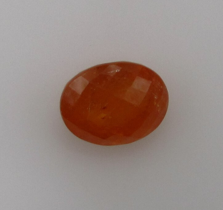 5.02 Carat, Yellow Orange Tangerine Garnet, 10 x 8 Oval, Very Slightly Included.