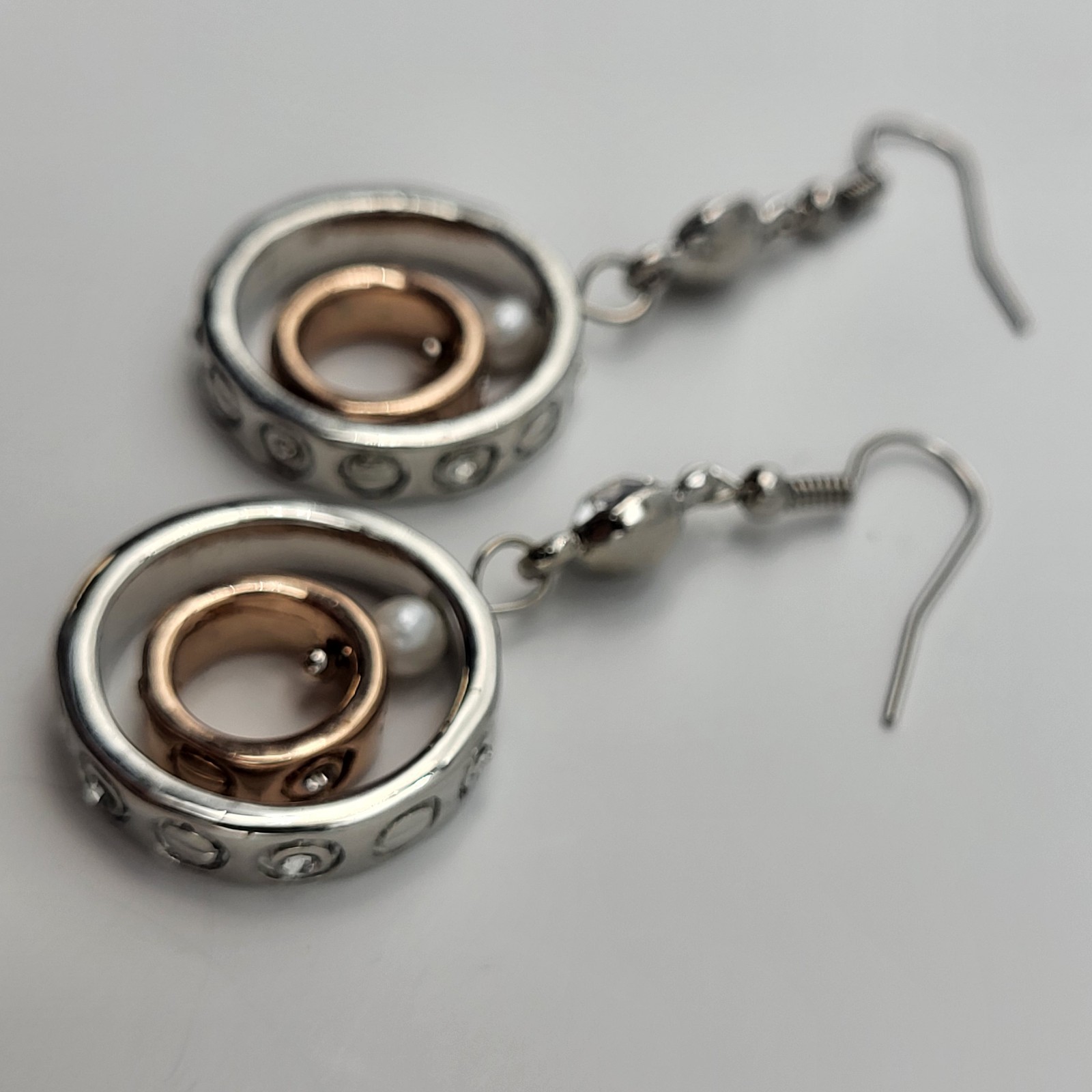 Fun Mixed metals articulated earrings screw print pierced dangles