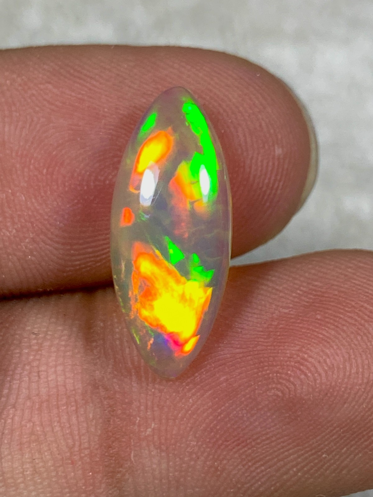 Natural Dark Base Ethiopian Opal 2.85crt Rainbow Fire Marquise Cabochon Gemstone