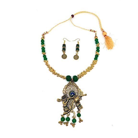 Alloy Krishna Flute Locket Oxidized Jewel Set ( Green, Gold Colored )