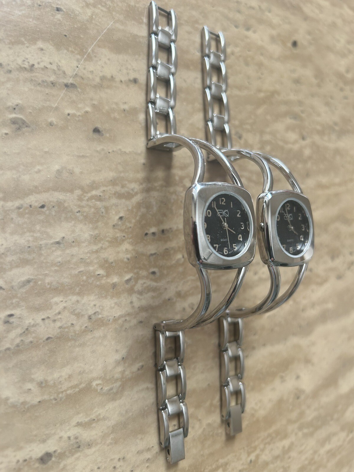 2 brand new EKO Silver Japan Quartz Watches (the Buyer gets 2 Watches)USA Vendor