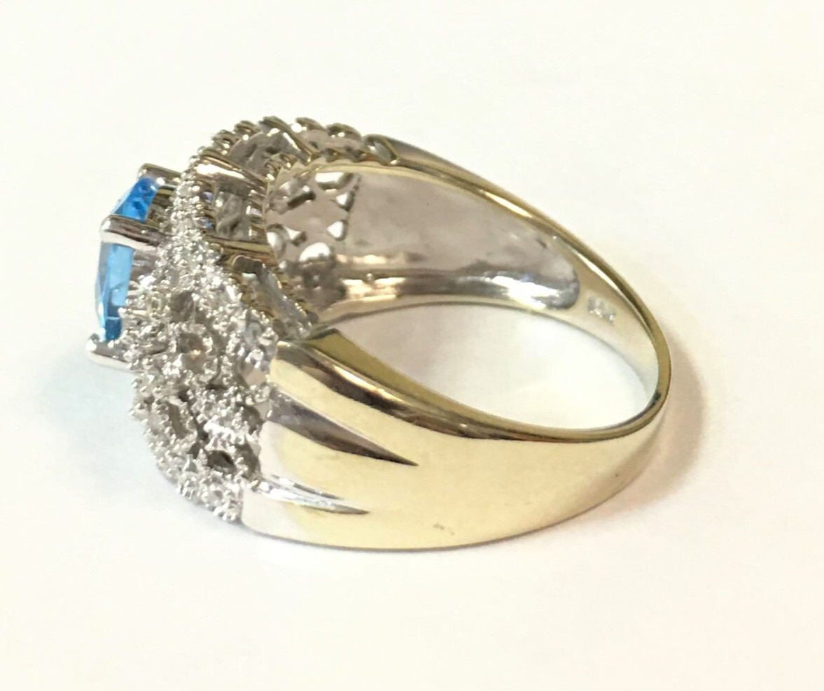 14k White Gold Ring with Blue Topaz and 0.16ctw Diamonds (Size 6.75) 5.3 gram