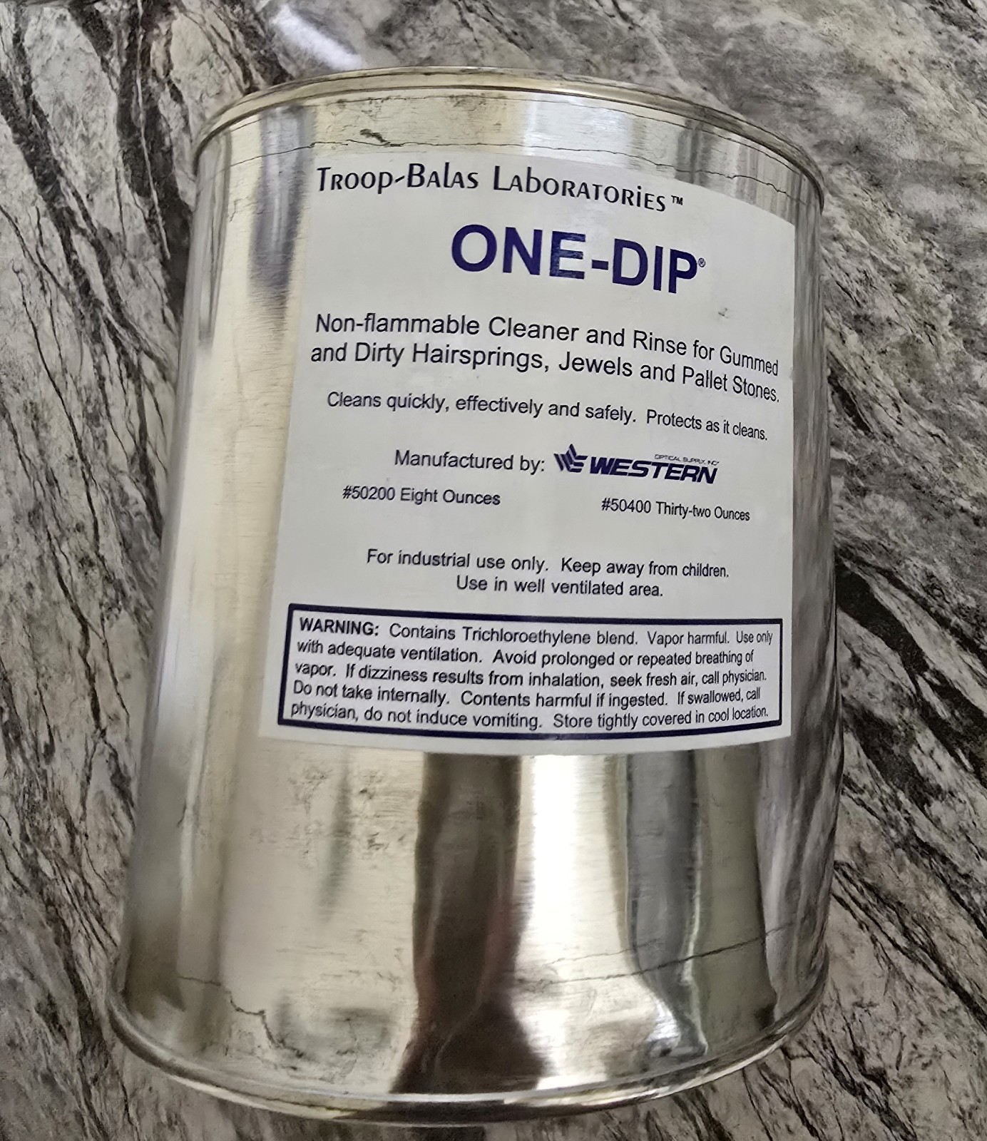 USA Made ONE-DIP cleaning solution for hairsprings and watch parts.