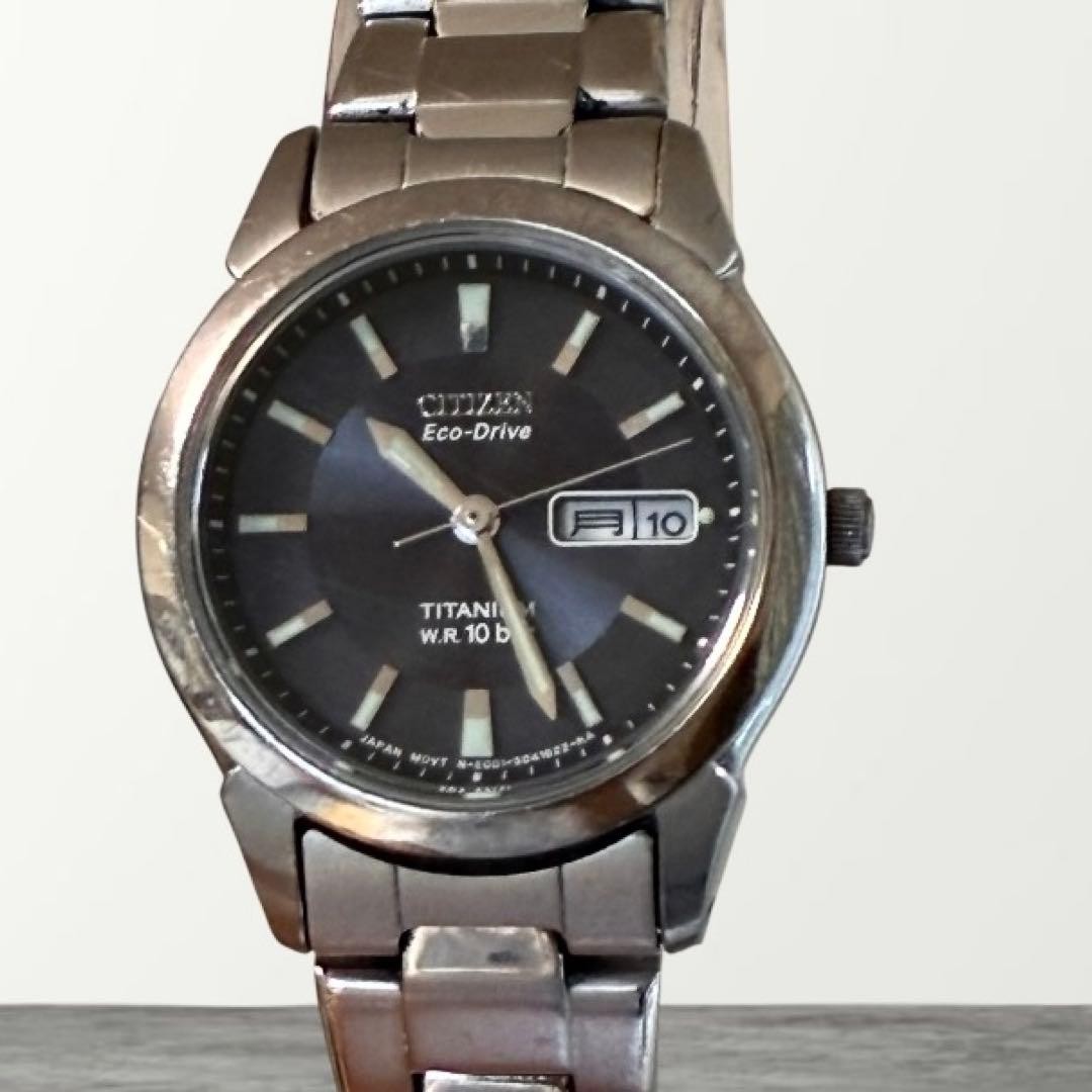 [Working] CITIZEN Eco-Drive E001-S024633, with engraving on the case back.
