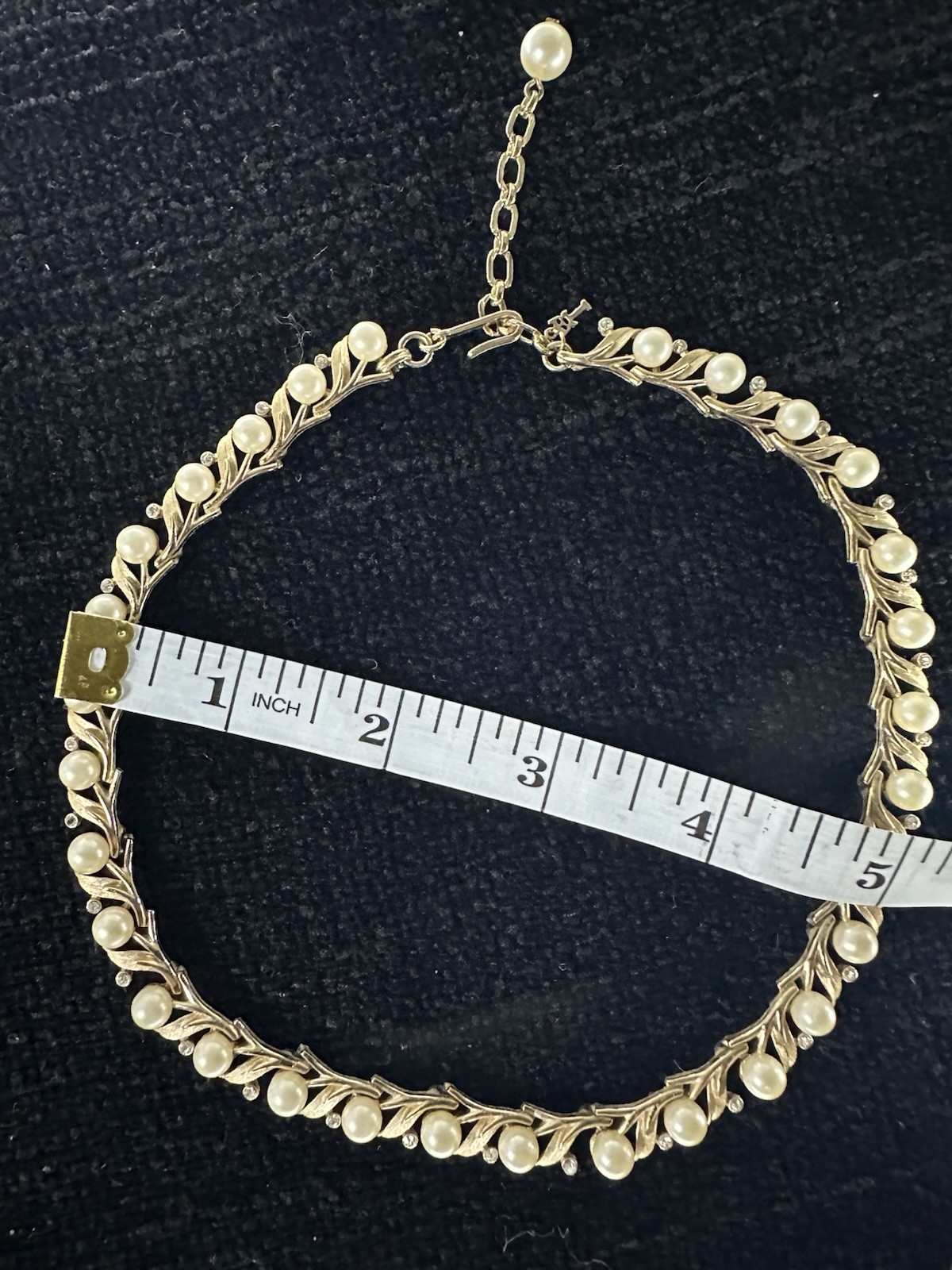 Vintage Crown Trifari Signed brushed Gold Tone Faux Pearl with rhinestone.