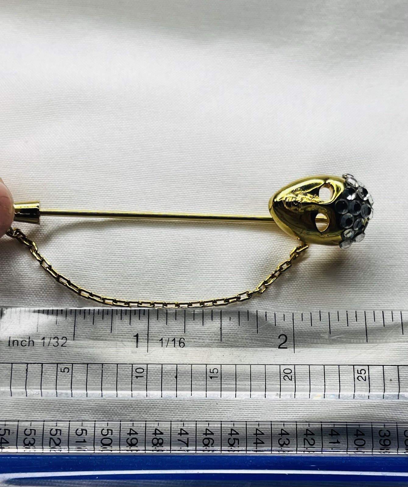 Gold-Tone Stick Pin w/ Safety Chain, Rhinestone. Missing stone. 80’s vintage