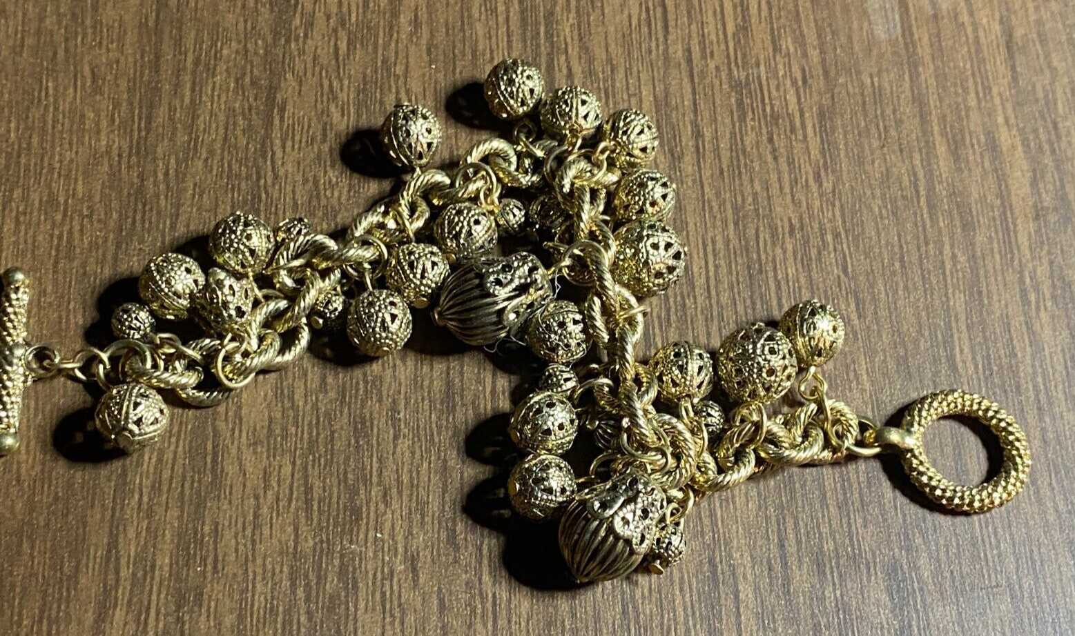 Vintage NOS Mesh Balls Gold Tone Dangle Charm Bracelet Toggle Clasp 7.5″ unworn