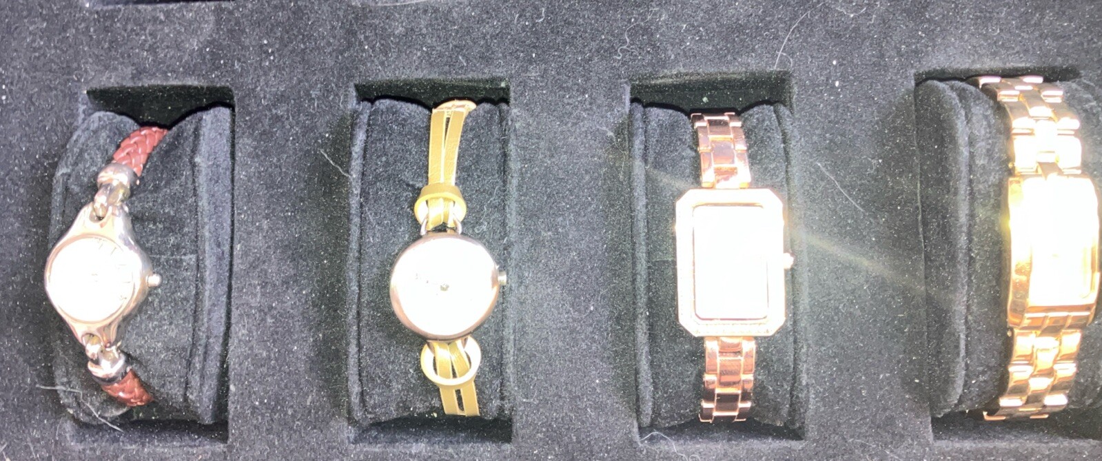 4 Lady, wrist watches preowned each will need a battery. Buyer is buying 4 Watch