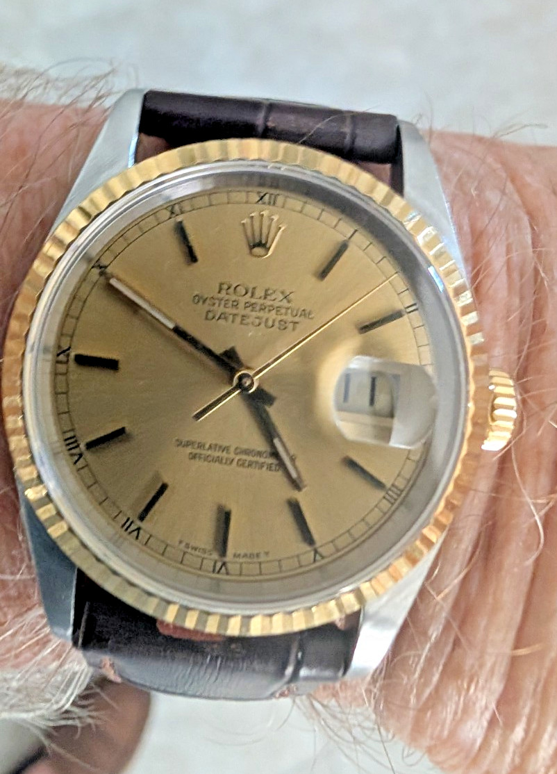 ROLEX SS/18 36MM DATEJUST ON LEATHER BAND. NO HOLES CASE, MINT.