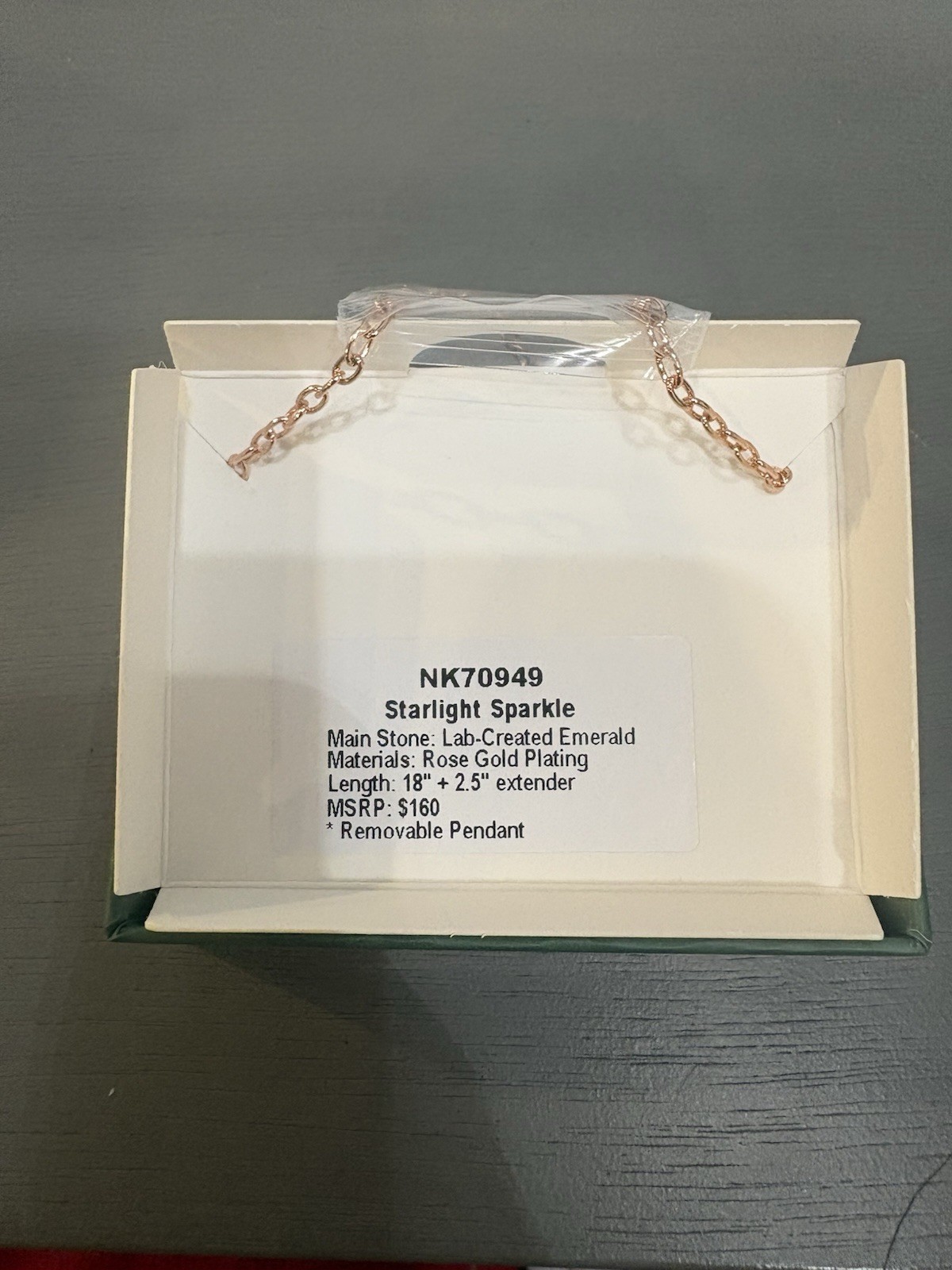 NK70949 Starlight Sparkle Main Stone: Lab-Created Emerald Rose Gold Plating