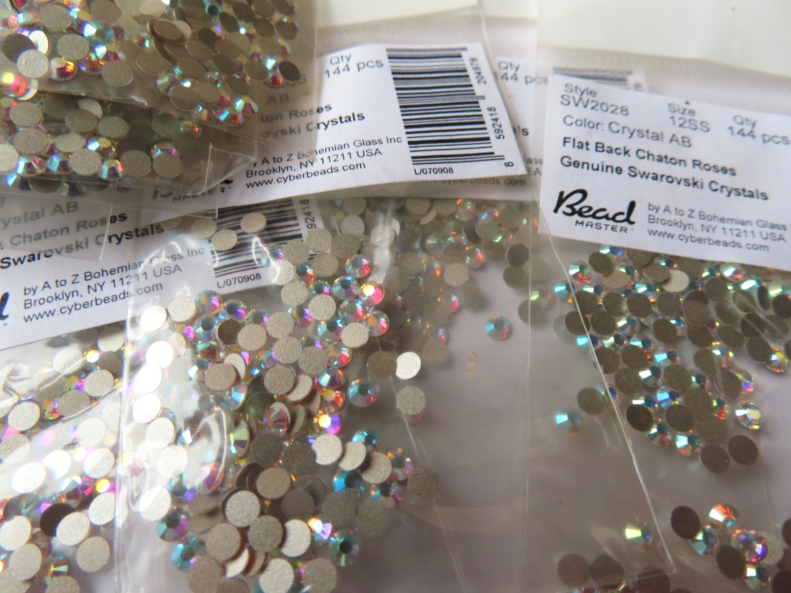 144 Swarovski Flatbacks 12ss Crystal AB/foiled. #2028
