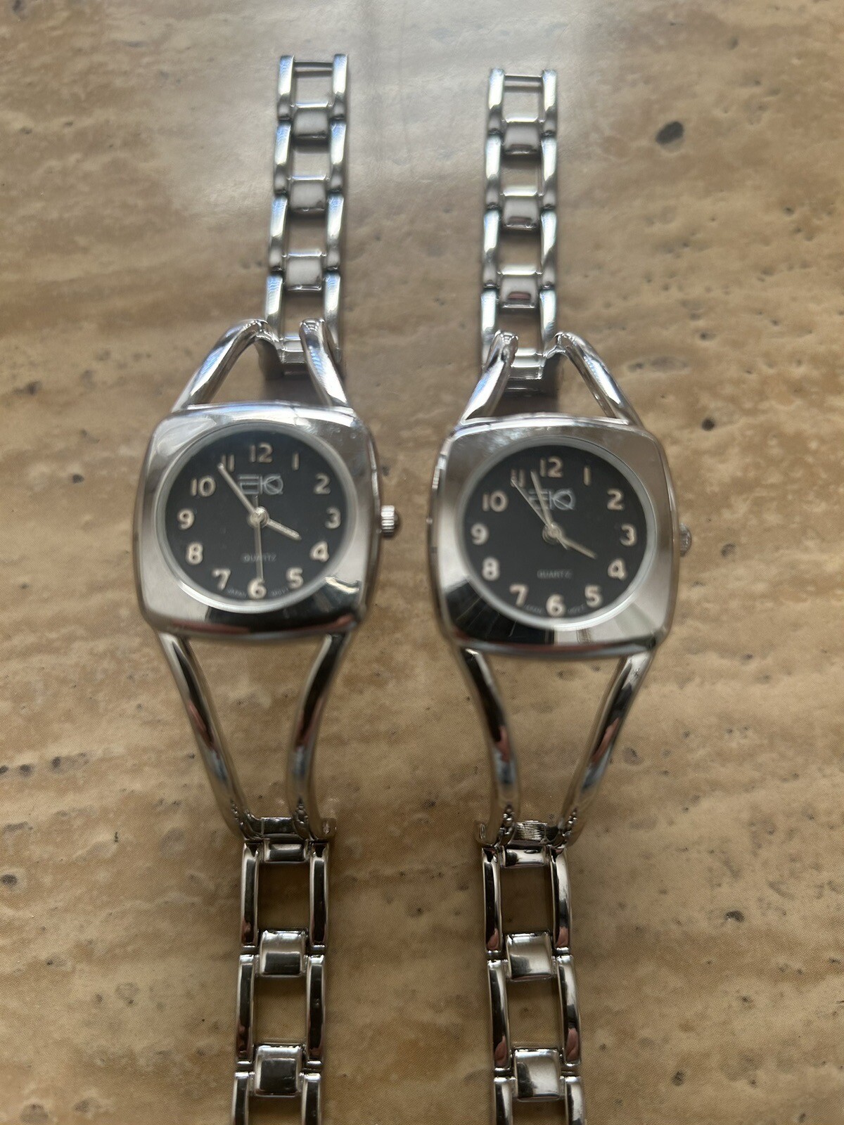 2 brand new EKO Silver Japan Quartz Watches (the Buyer gets 2 Watches)USA Vendor