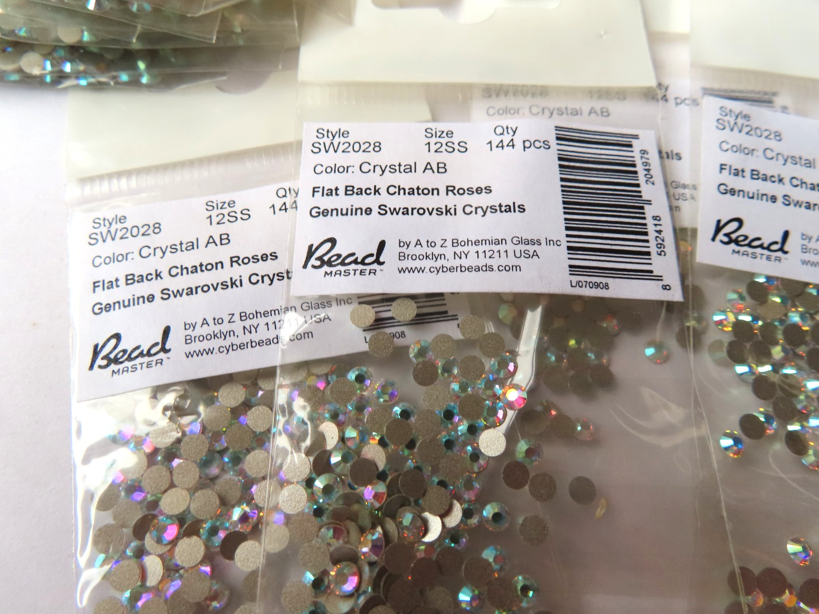 144 Swarovski Flatbacks 12ss Crystal AB/foiled. #2028