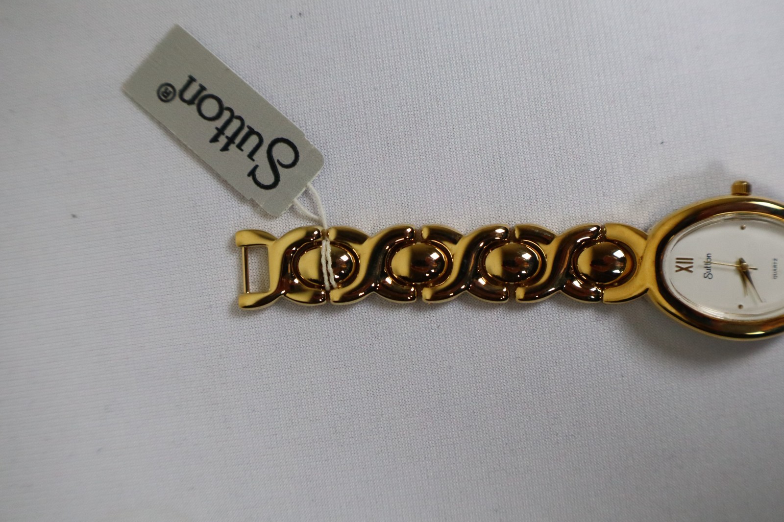 Sutton Quartz Watch Gold Tone Oval Face NIB Needs New Battery ONE YEAR WARRANTY