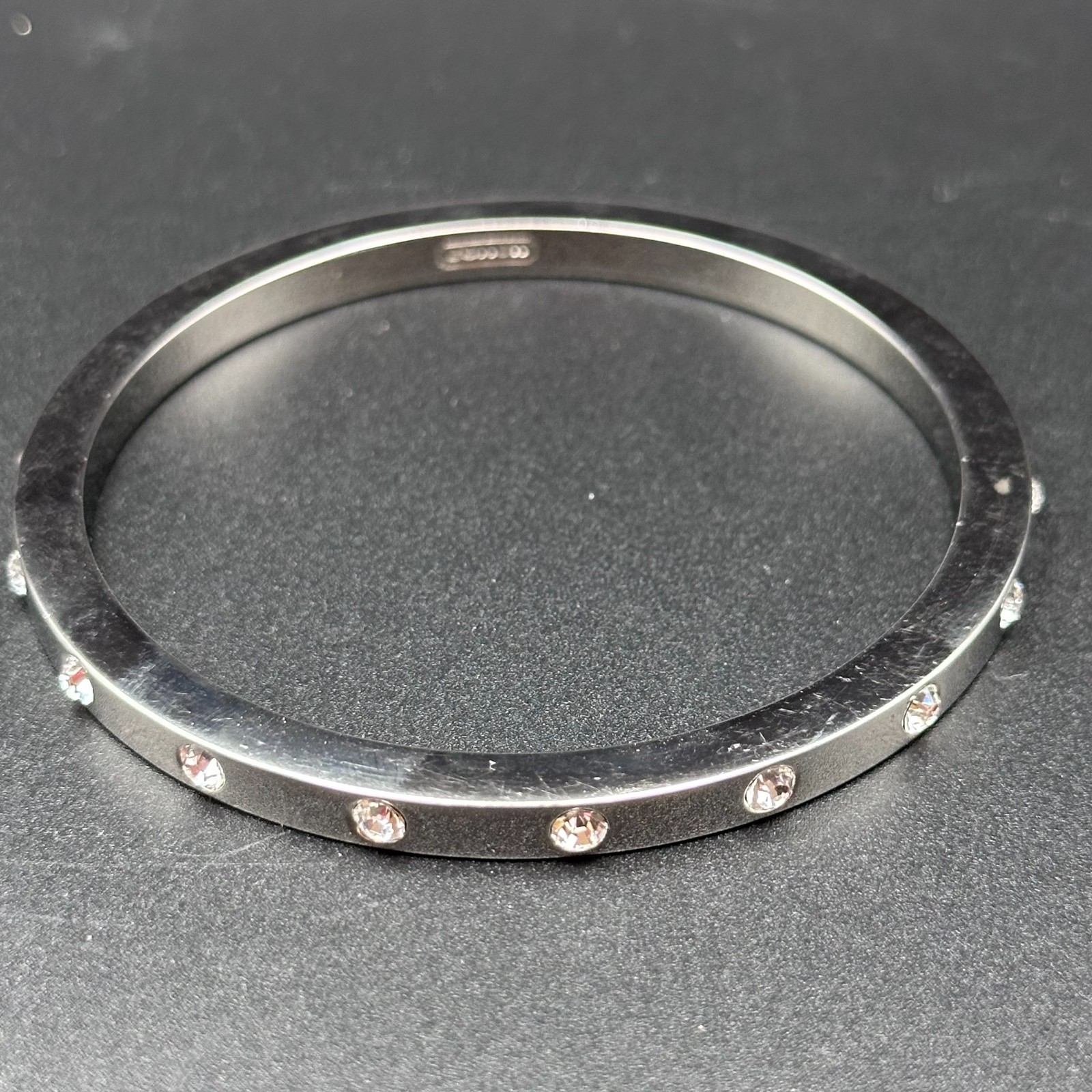 Coast Silver‑Tone Bangle – Bezel‑Set Crystal Accents