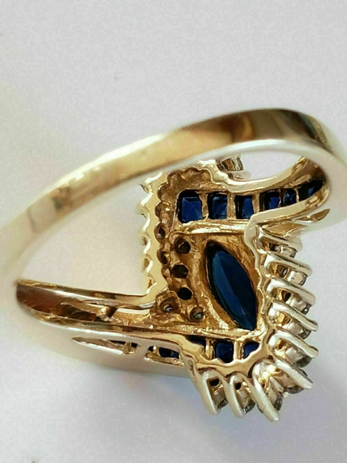 2.5Ct Marquise Cut Lab-Created Sapphire Engagement Ring 14K Yellow Gold Finish