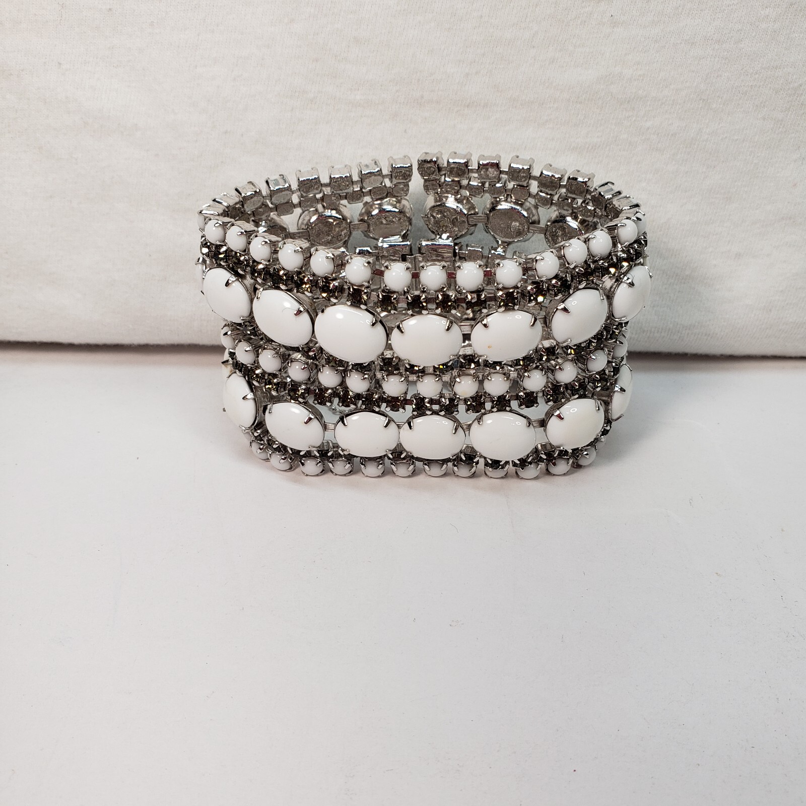 Milk Glass Bracelet With Crystal Rhinestones, 9 Rows. 7in Long 2in Wide