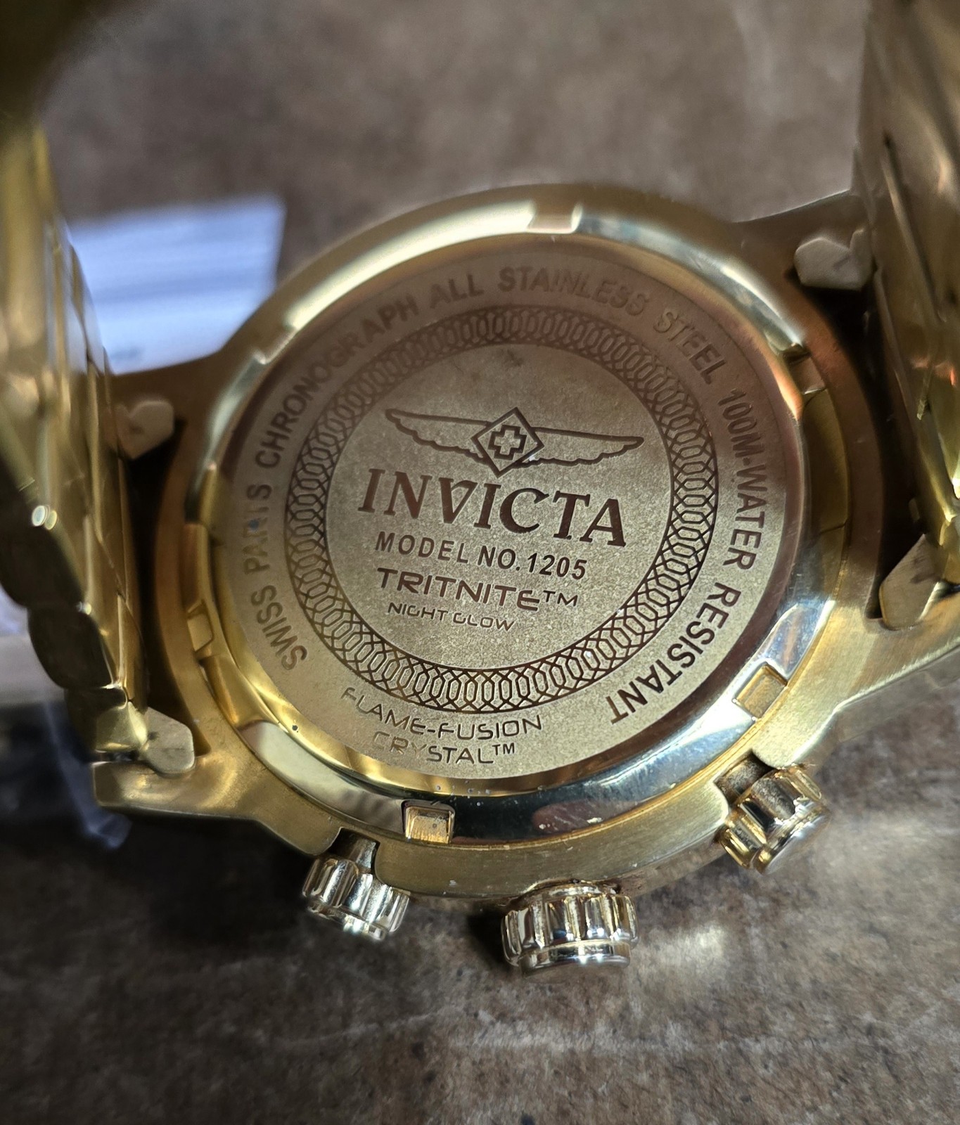 Invicta Men’s Watch Model 1205 chronograph gold with blue dial and bezel