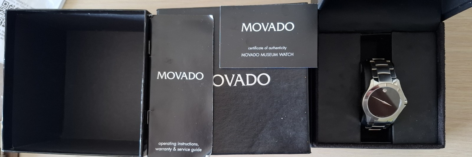 Movado Museum Men’s Quartz Black Dial Sapphire Water-Resistant Watch Box Paper.