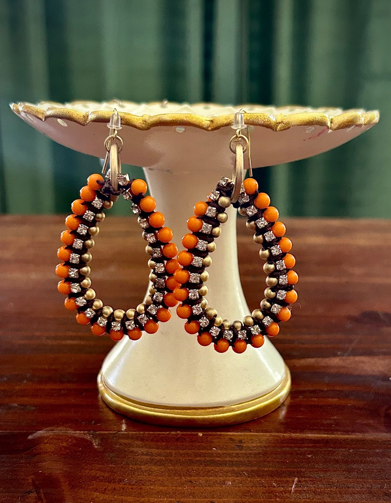 Orange beaded dangle earrings