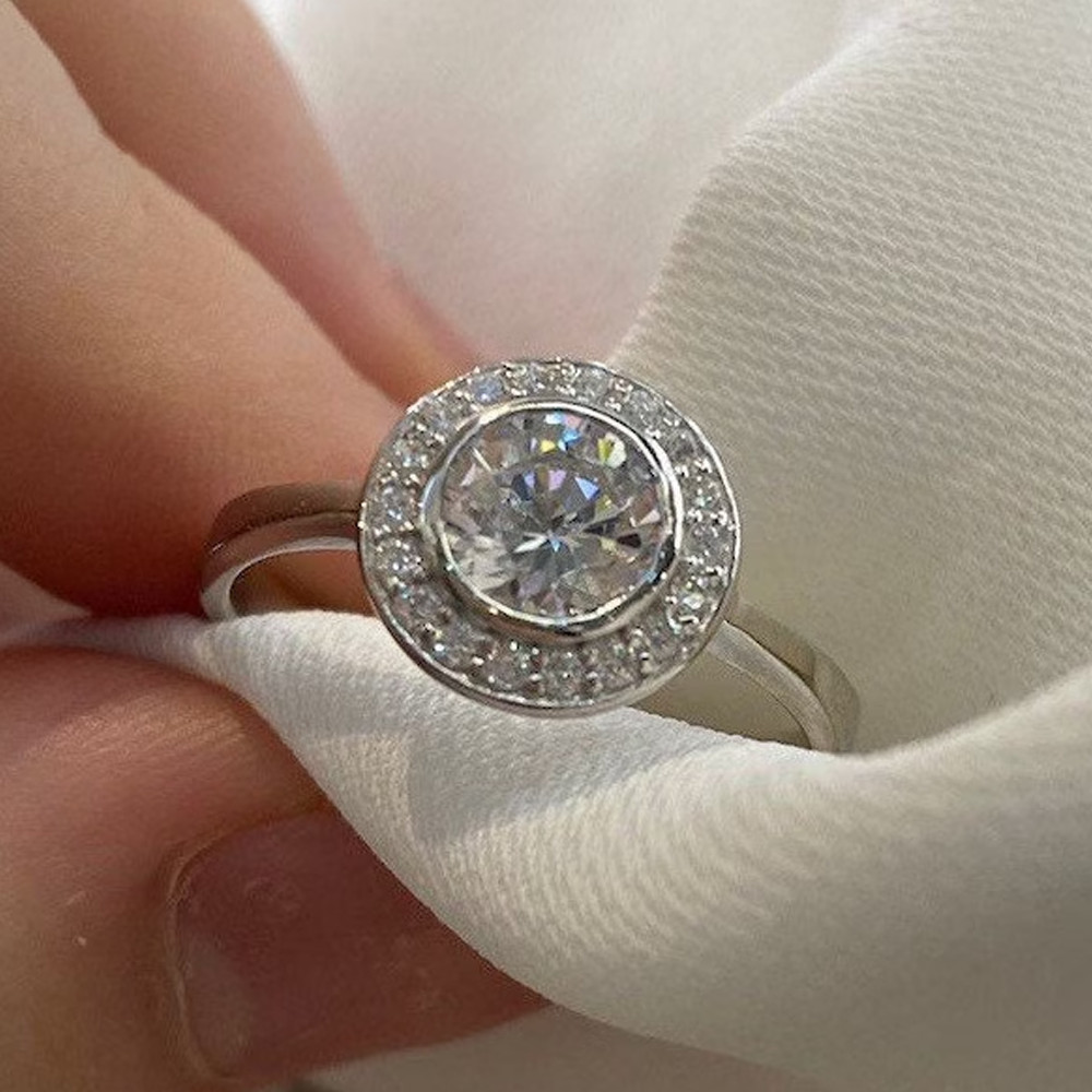 1.00 TCW Round Cut Moissanite Halo Engagement Ring In 14K White Gold Plated