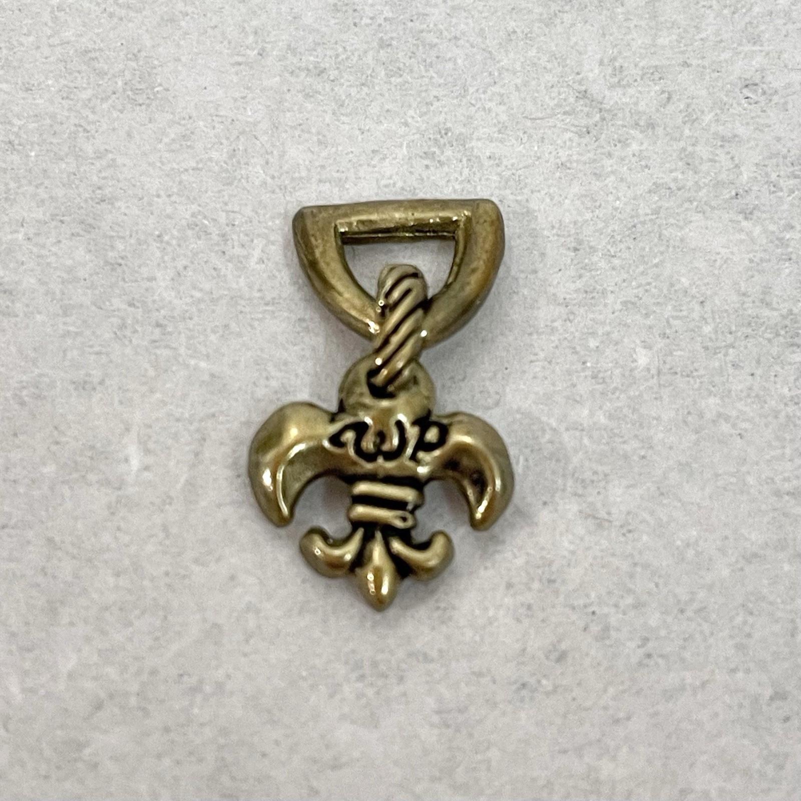 Waxing Poetic Brass Fleur de Lis Small Charm