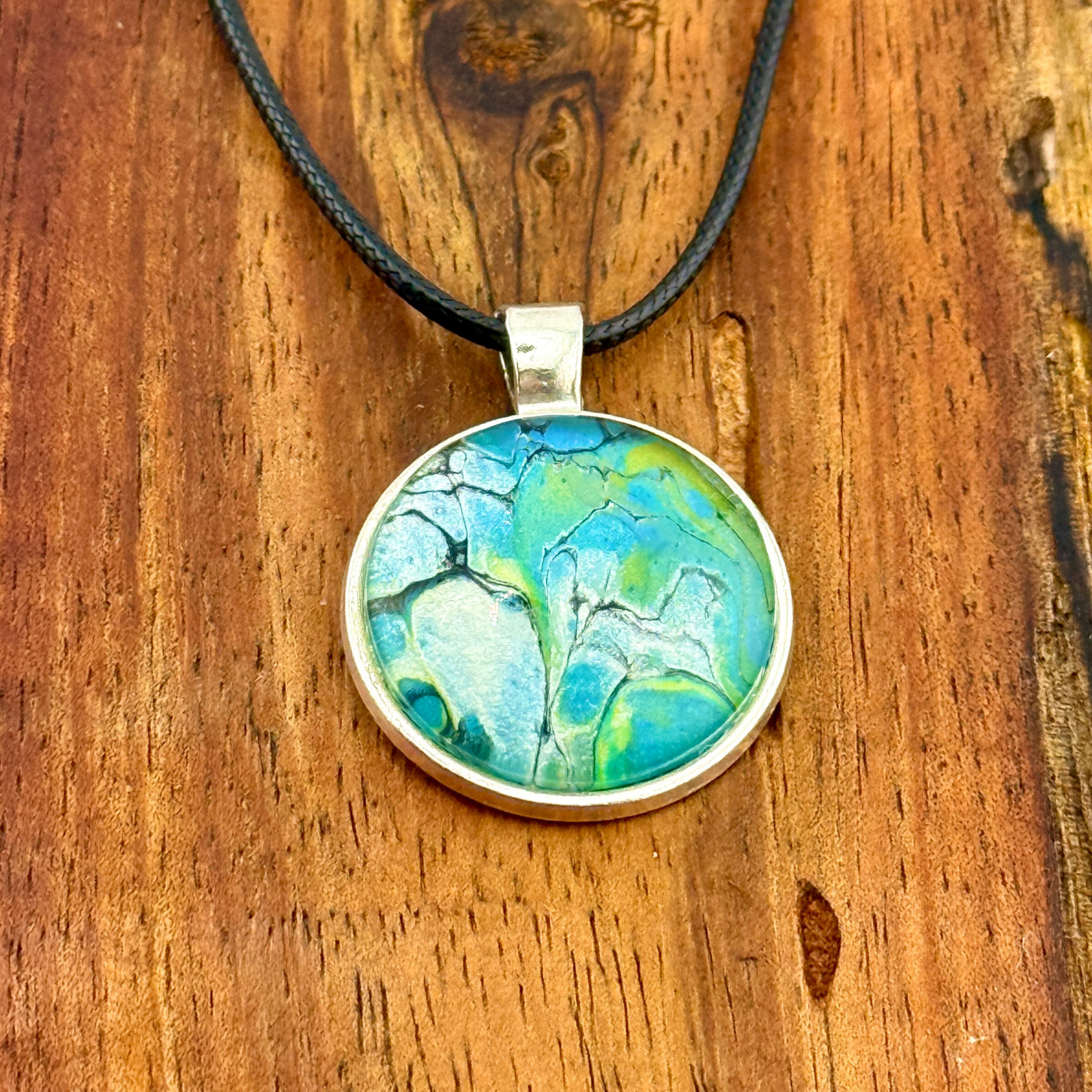 Pendant Necklace Handmade “Burbling Stream” Silver Bezel 25mm Black Cord