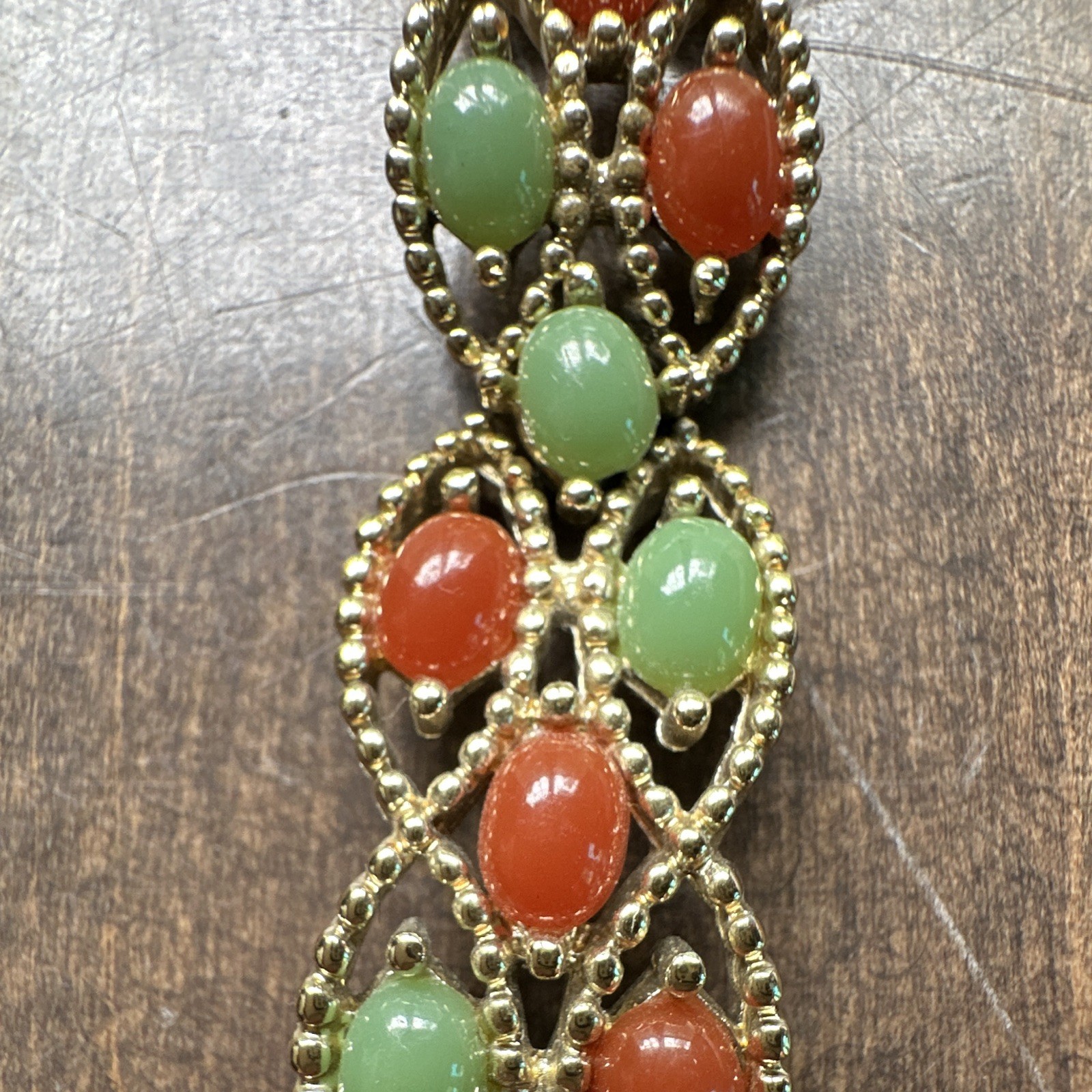 Sarah Coventry Signed Gold Tone Link Bracelet Green/Orange Cabochons Fold Over