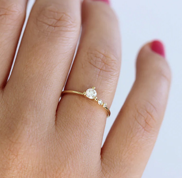 Prong & Bezel Set Round Shape Moissanite In 10K Yellow Gold Women’s 3 Stone Ring
