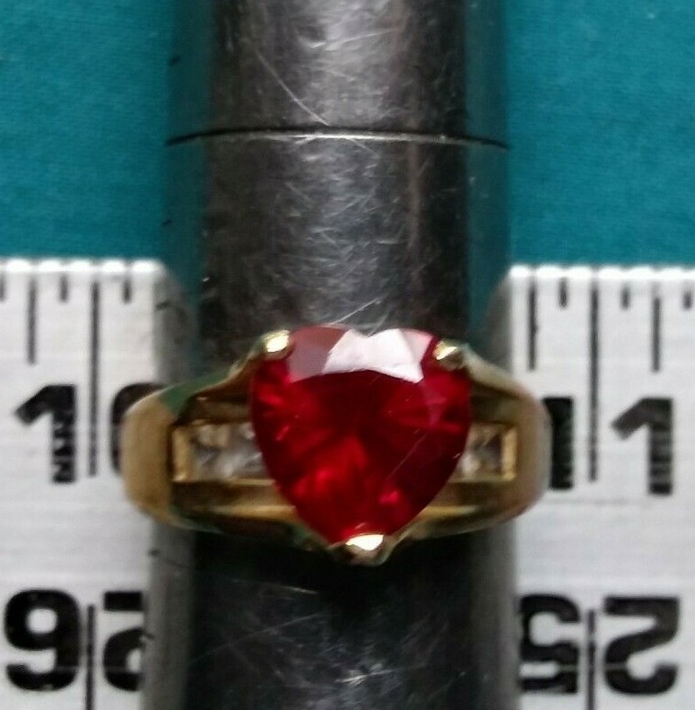 14kt Gold Ring Synthetic Ruby and 6 Princess Cut stones size 7. 5.3 gram #2094