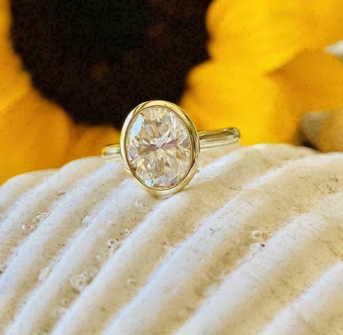2 CTW Oval Cut VVS1 Moissanite Bezel Set Engagement Ring 14K Yellow Gold Plated