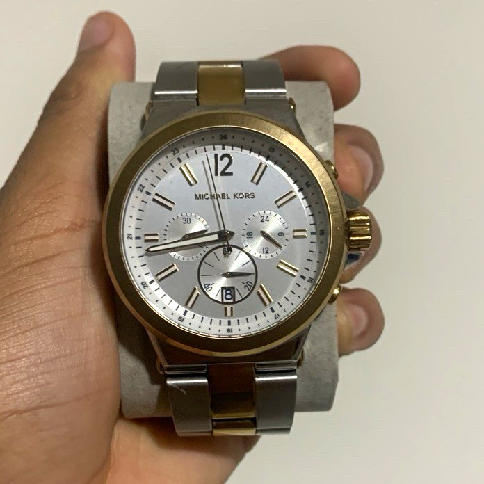 Michael Kors Dylan Chronograph, silver dial, two-tone steel bracelet.