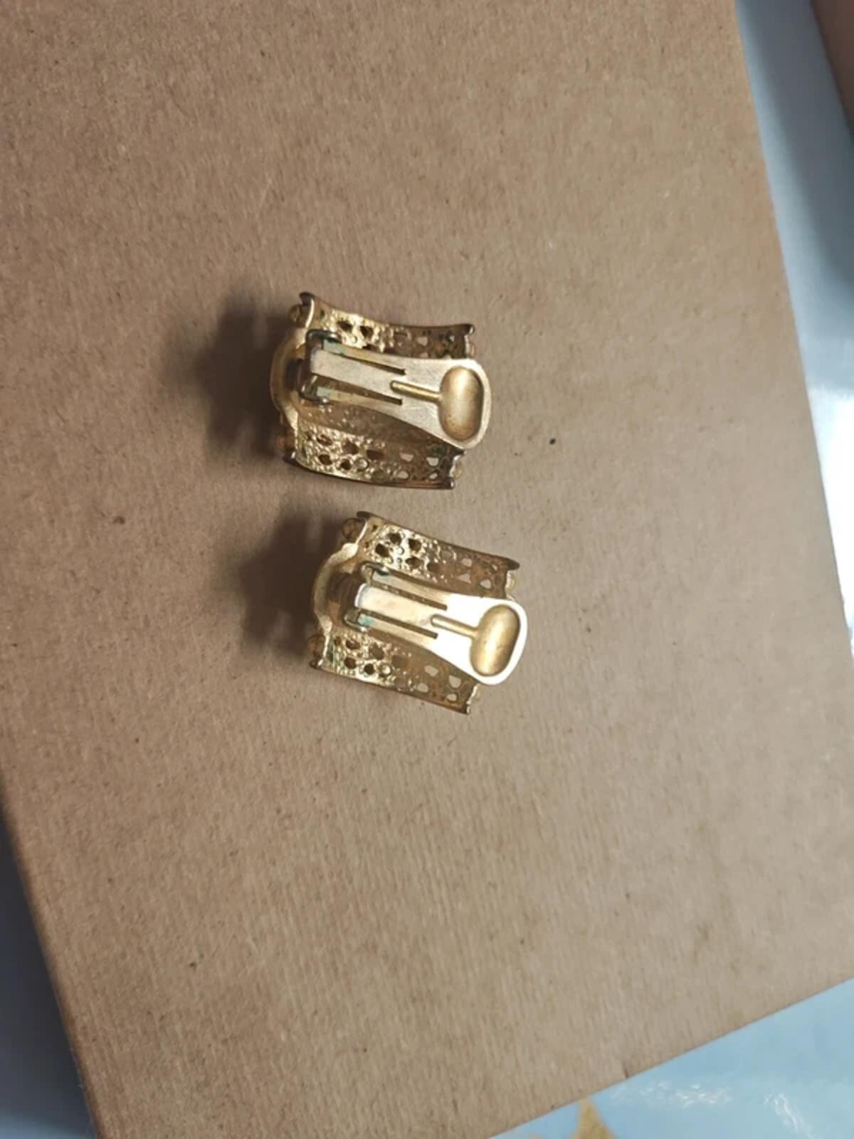Gold and black earrings