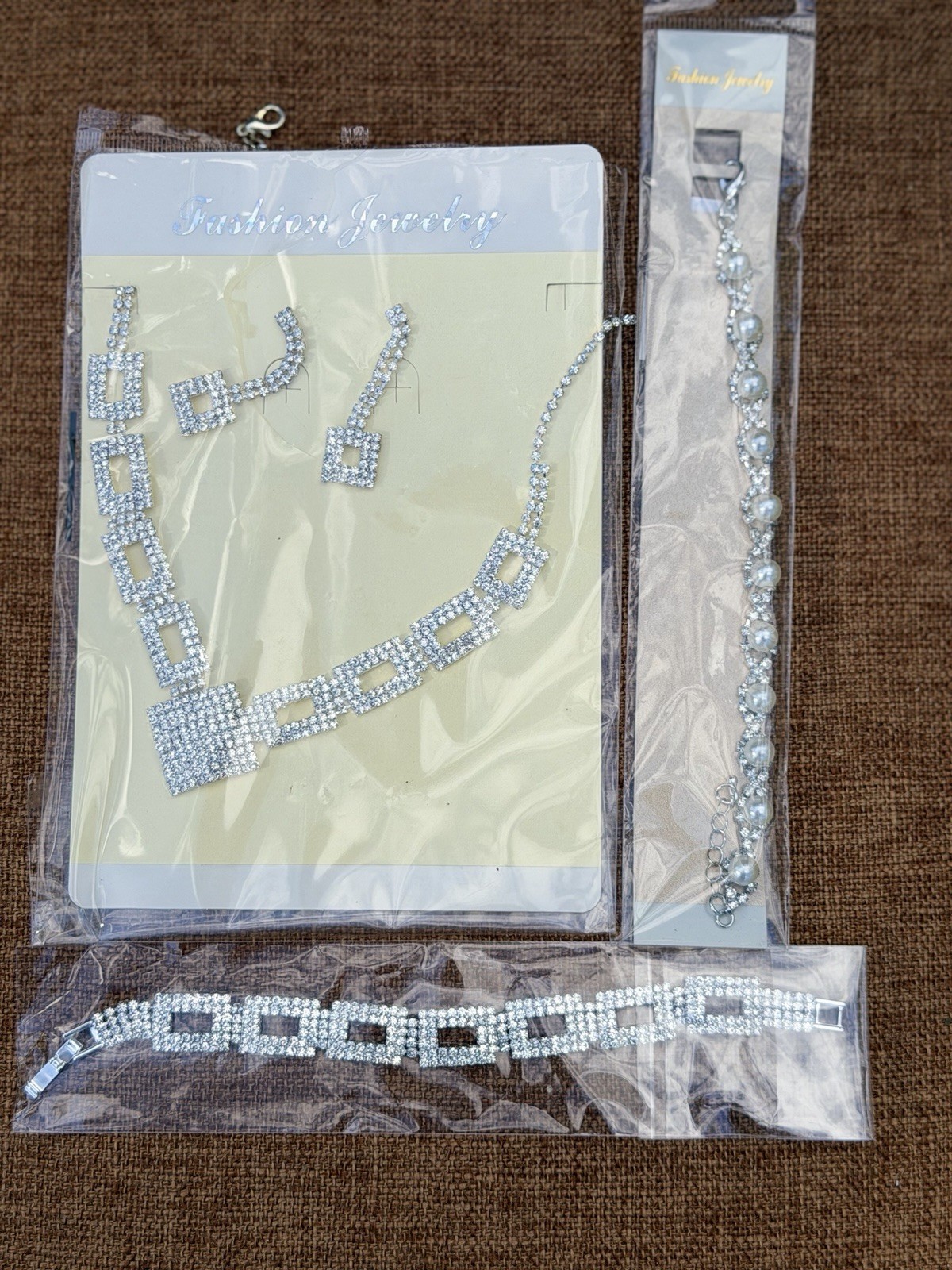 1 Pair of Earrings & Necklace & Two Bracelets Silver Tone