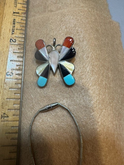 2 items Zuni butterfly pendent and a turquoise small necklace all Unmarked.