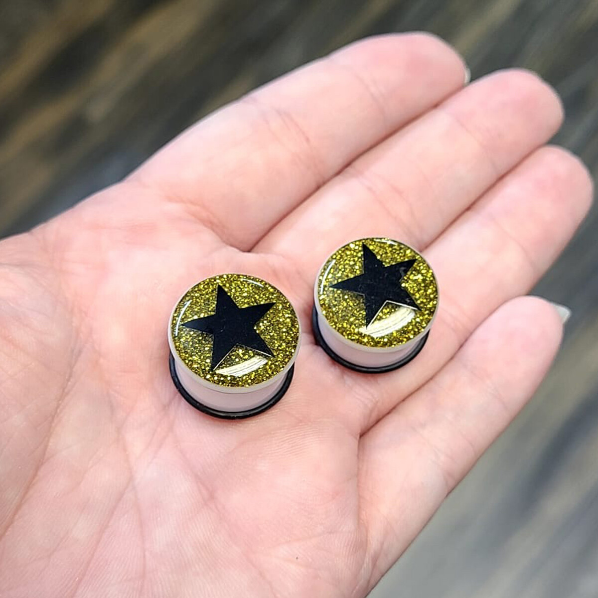 Acrylic O-ring Ear Plugs Gauges Black Star Gold Glitter Design Sold as a pair