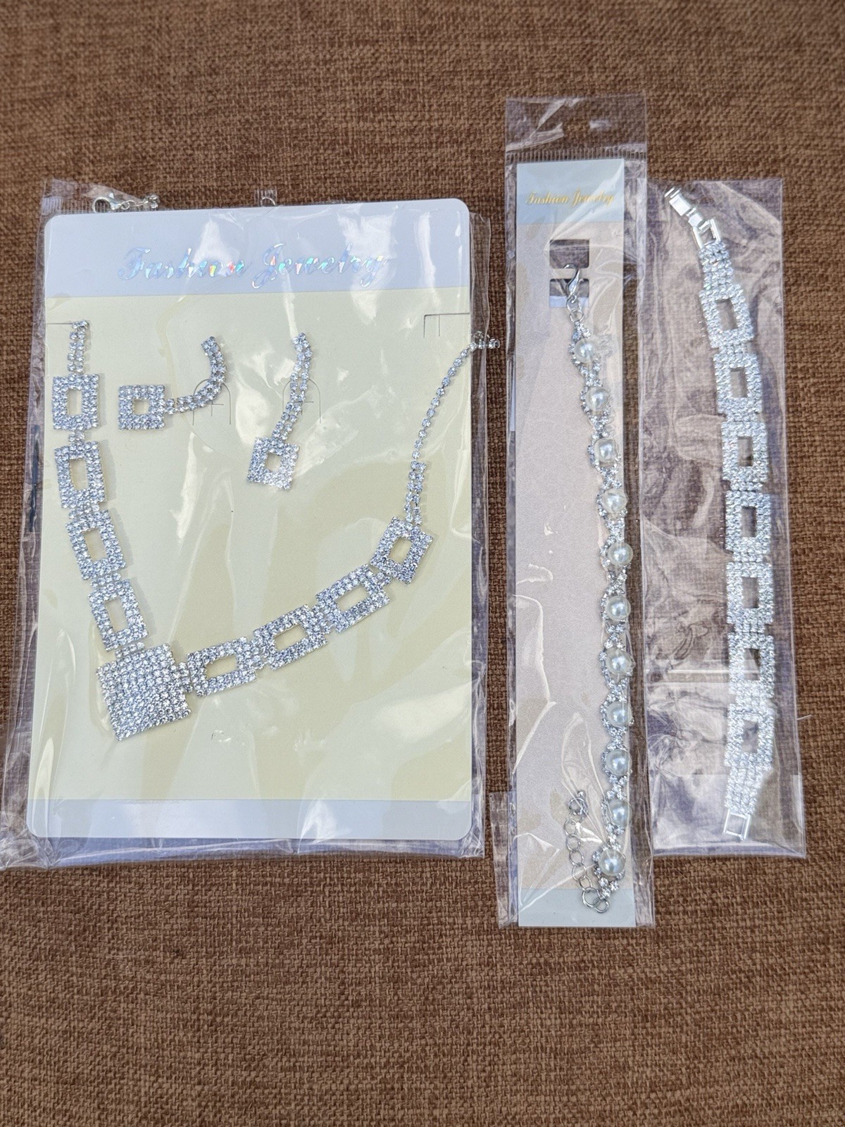 1 Pair of Earrings & Necklace & Two Bracelets Silver Tone