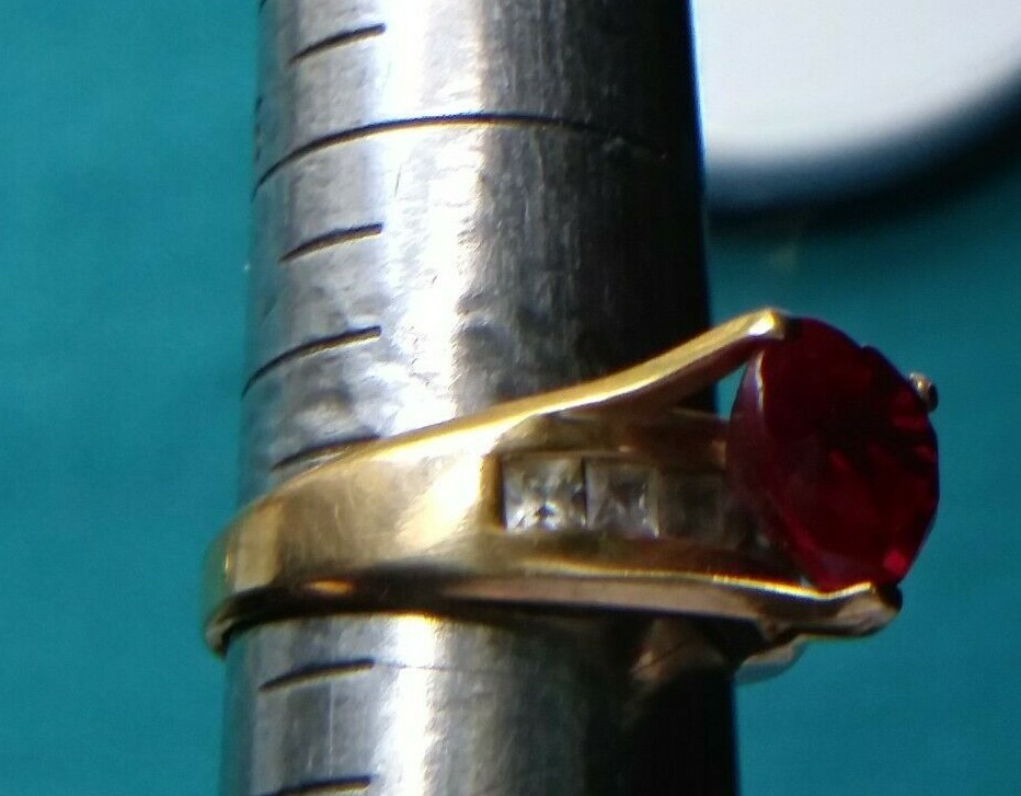 14kt Gold Ring Synthetic Ruby and 6 Princess Cut stones size 7. 5.3 gram #2094
